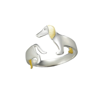 Adjustable dachshund open ring with two-tone silver and gold plating on white background