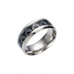 Minimalist silver and black stainless steel ring featuring engraved dolphin patterns