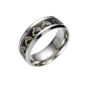 Polished stainless steel wide ring with black enamel band and golden dolphin pattern