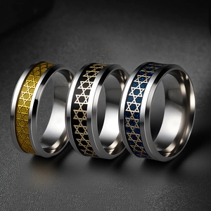 Men's vintage hollow star titanium steel rings in gold, black, and blue finishes