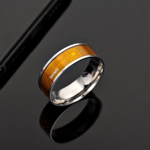Smart NFC ring with orange PCB texture inlay and polished stainless steel finish