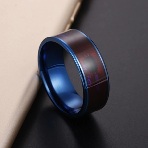Blue electroplated NFC smart ring with visible circuit chip design on black background