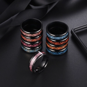Luminous stainless steel Celtic dragon ring with vibrant multi-color inlay designs