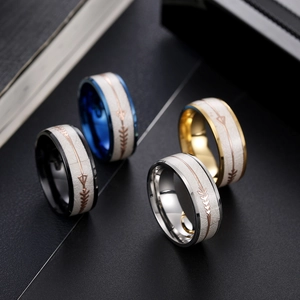 Detail of 8mm arrow inlay titanium steel rings in black, blue, gold and silver