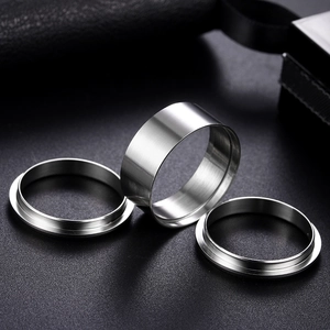 Industrial brushed stainless steel ring set with wide band and flanged edge accessories