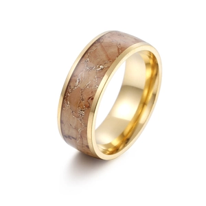 Macro detail of 8mm gold ring featuring vintage wood grain and marble resin inlay