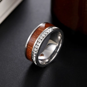 Macro detail of luxury ring with acacia wood inlay and crystal zircon embellishments