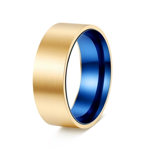 Detailed macro of brushed gold exterior and blue electroplated interior of the steel ring