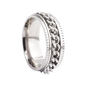 Detailed view of silver spinner ring featuring rotating Cuban chain and grooved edges