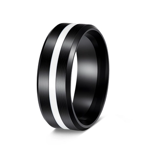 Macro detail of 8mm black brushed stainless steel ring with a central silver racing stripe