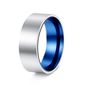 Macro detail of men's two-tone ring with silver brushed exterior and blue polished interior