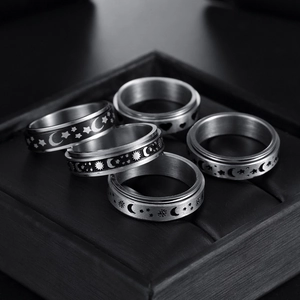 5-piece spinner ring set for men with celestial sun moon and star patterns