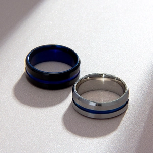 Minimalist two-tone stainless steel rings with blue plating and polished finish