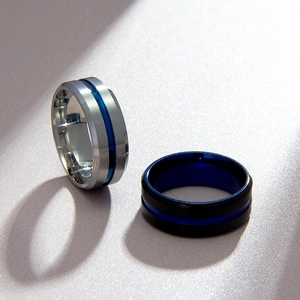 Two-tone men's stainless steel rings in silver and black with stylish blue center grooves
