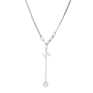 Detail of Y-shaped silver necklace featuring paperclip chain and H-letter pendant