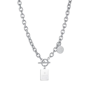 Detailed shot of hip hop style stainless steel chain necklace with engraved love pendants