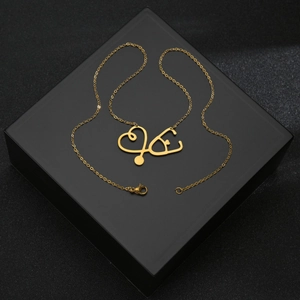 Collier cœur stéthoscope doré pour femme en acier inoxydable de haute qualité