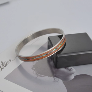 Bracciale in acciaio al titanio con venature del legno e intarsio in abalone su scatola