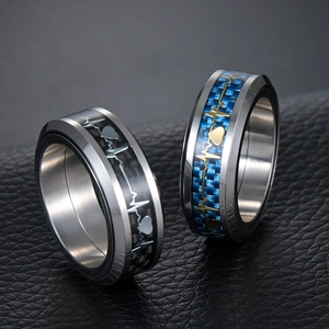 Men's titanium steel spinner ring set with carbon fiber inlay and heartbeat pattern
