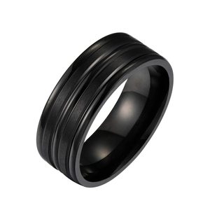Macro detail of men's black titanium steel ring with brushed finish and double grooves