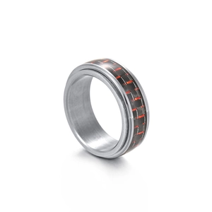 Detail view of 8mm rotating spinner ring with black carbon fiber and orange accents