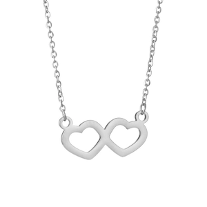Close-up of interlocking silver double heart pendant on a delicate chain necklace