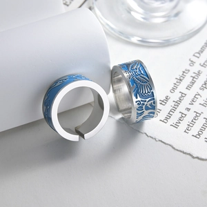 Men's open adjustable rings set with blue enamel clouds and flying bird motifs