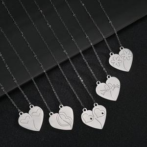 Couples heart pendant necklace set in stainless steel with engraved floral and deer patterns