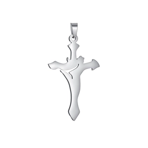 Macro detail of silver hollow cross pendant with a polished mirror finish surface