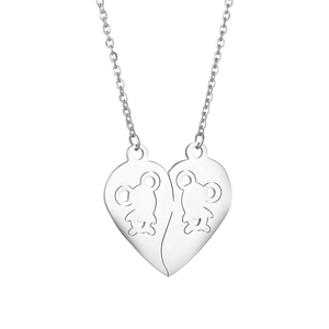 Detail view of interlocking heart pendants with cute koala cutouts in silver steel