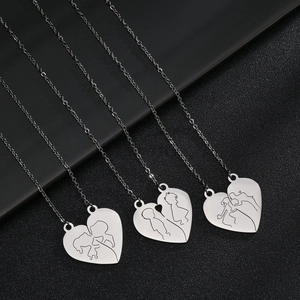 Polished stainless steel heart puzzle necklaces with romantic engravings for couples