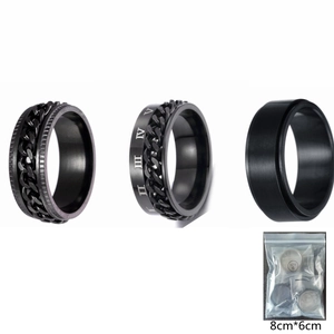 Three-piece set of black spinner rings for men featuring Roman numerals and matte finish