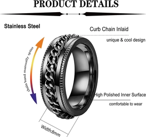 Detail of 8mm black stainless steel spinner ring with inlaid curb chain and polished finish