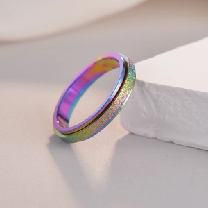 Rainbow titanium steel spinner ring for women with purple frosted sand texture