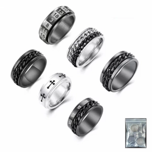 Detail of 6-piece rotatable stainless steel stress relief rings in black and silver