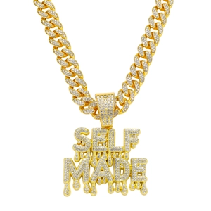 Iced out gold Cuban link necklace featuring a SELF MADE dripping letter pendant for men