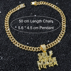 Close-up of golden hip hop chain with iced-out SELF MADE pendant showing 50cm length