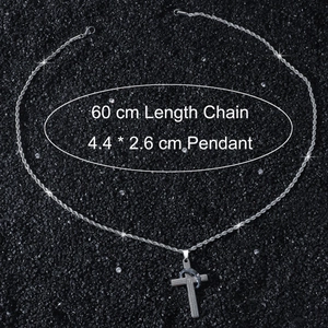 Detail of silver cross pendant with black ring and engraved text on 60cm rope chain