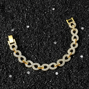 Goldenes Gliederkette-Armband mit Unendlichkeitssymbol und weißen Steinen besetzt