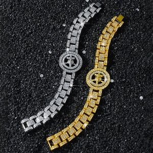 Hip hop iced out spinning cross bracelet with cuban links in gold and silver finish