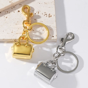 Porte-clés mini sac à main en alliage de zinc doré et argenté avec fermoir mousqueton