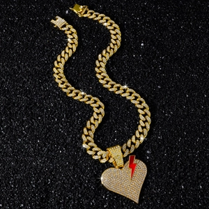 Hip-hop gold cuban link chain with iced out broken heart and red lightning pendant