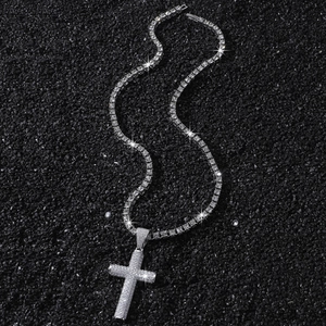 Luxury hip-hop iced out cross pendant with cubic zirconia on a shiny tennis chain