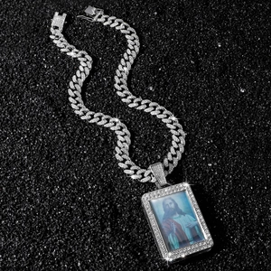 Iced out silver Cuban chain necklace with a square Sacred Heart of Jesus pendant