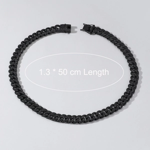 Detail of 13mm black iced out Cuban link necklace with crystal buckle, 50cm length