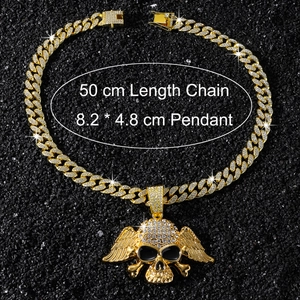 Detailed size view of hip hop skull pendant with wings on a 50cm golden Cuban link chain