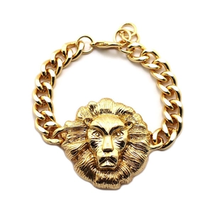 Golden lion head charm bracelet with chunky Cuban link chain and lobster clasp