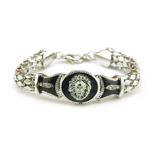 Silver alloy lion head bracelet with black enamel, rhinestones and mesh chain link