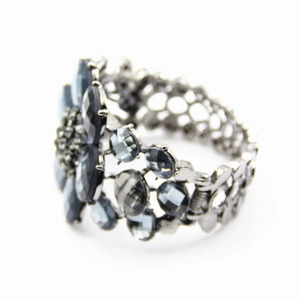 Exaggerated vintage alloy cuff bracelet with layered dark grey crystal flower petals