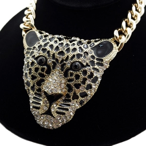 Luxurious gold leopard head necklace with sparkling rhinestones and black curb chain